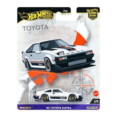 Машинка Premium Hot Wheels '82 Toyota Supra World Tour 1:64 HRV97 White - Retromagaz